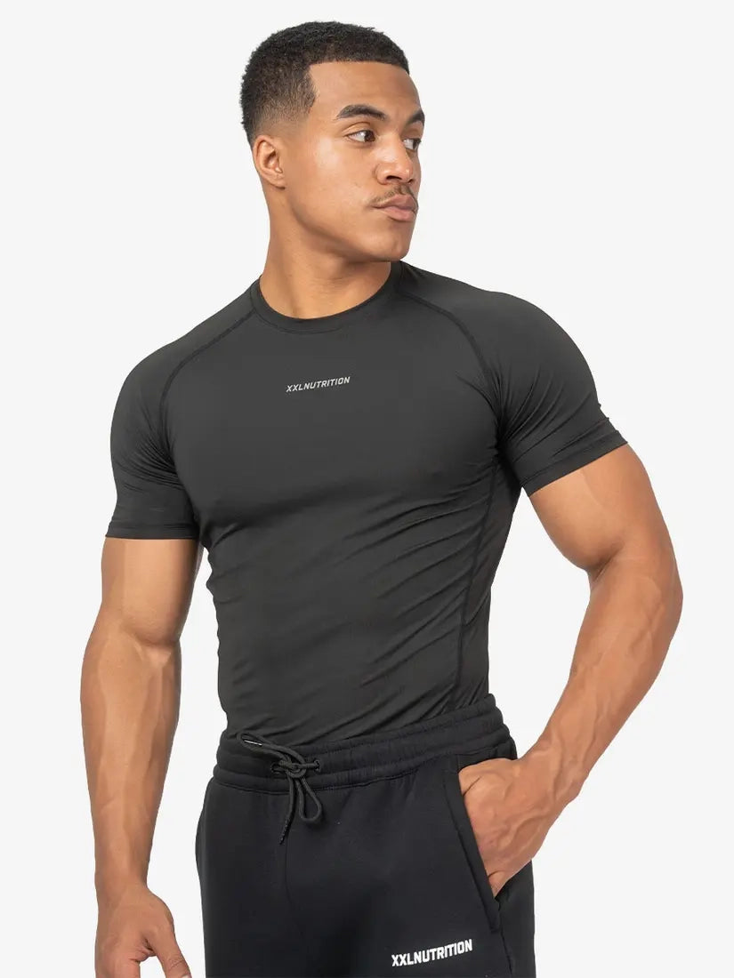 Schwarzes XXL Nutrition Kompressions-T-Shirt für Damen, atmungsaktives und eng anliegendes Sportshirt aus elastischem Material